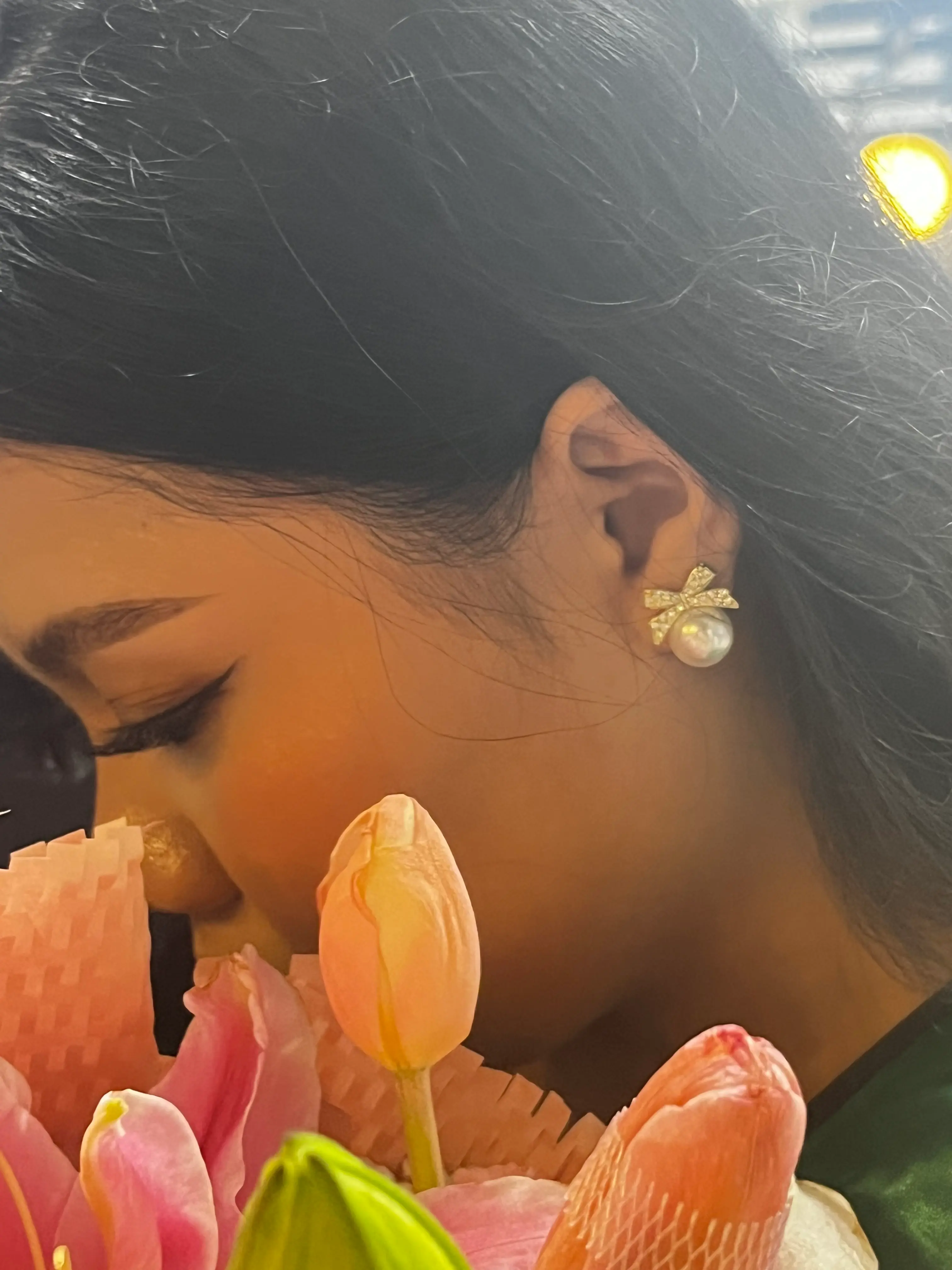 Ghea Tan wearing Jeyiee earrings